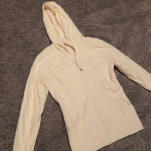 Lululemon light weight jacket cream size 12